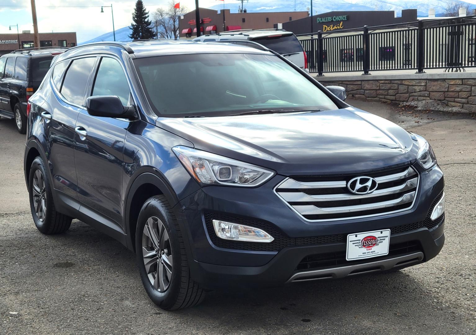 2016 Blue /Tan Hyundai Santa Fe Sport (5XYZUDLB6GG) with an 2.4L I4 engine, 6 Speed Automatic transmission, located at 450 N Russell, Missoula, MT, 59801, (406) 543-6600, 46.874496, -114.017433 - One Owner. Clean Carfax. Heated Seats. Towing. Air. Cruise. Tilt. Backup Camera. Power Windows and Locks. AM FM Bluetooth. - Photo#3